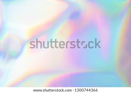 Iridescent background. Holographic Abstract soft pastel colors backdrop. Holographic Foil Backdrop. Trendy creative gradient. Royalty-Free Stock Photo #1300744366