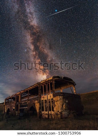 Beautiful night  landscape with Milky Way and old bus.  Armenia