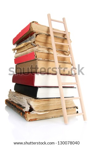 Old books and wooden ladder, isolated on white