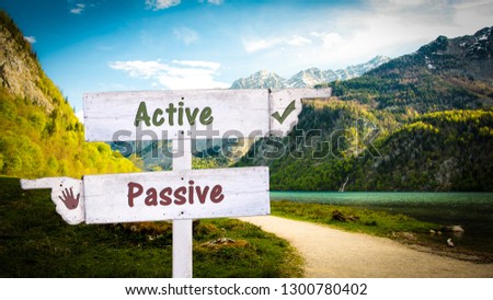 Street Sign Active vs Passive Royalty-Free Stock Photo #1300780402