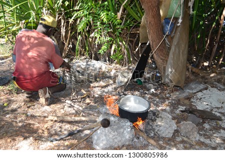 African People Making Traditional Coconut Soup