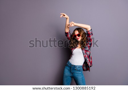 Close up portrait of amazing she her lady hands arms raise make strange dance moves red dark bright summer specs selebrity star famous person wearing casual checkered shirt isolated grey background