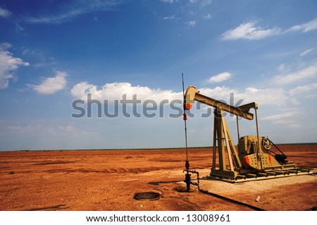 An oil pump or pumpjack on the plains of west Texas, United States of America