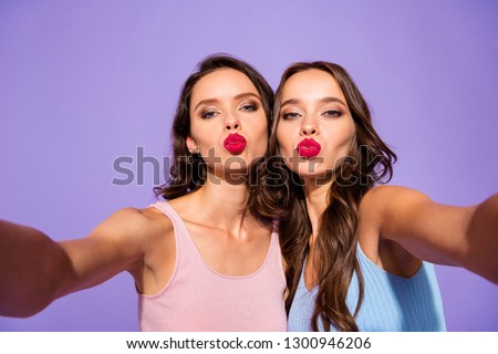 Close up photo fancy classy she her ladies bright pomade send air kiss make take selfies maquillage cosmetics speak tell talk video call wear dresses isolated purple violet vivid vibrant background