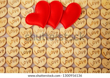 Natural wooden hearts with an inscription love