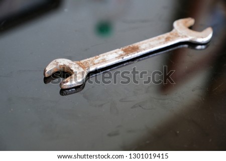 Wrench on the glass plate