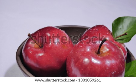 Apple on plate black. Fruit photoshoot