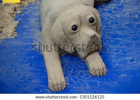 Dog made from sand