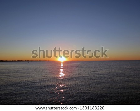 Beautiful sunset over the Adriatic sea, 
 Rimini, Italy, Europe.                               