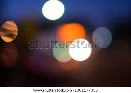 Dark night abstract shot of city traffic lights