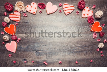 Heart shaped cookies on a rustic wood background for Saint Valentine's Day