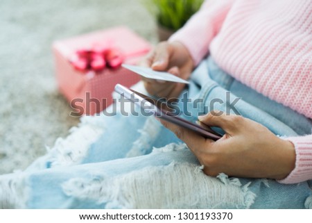 Young woman hands using smart phone for online shopping