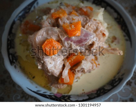 Stewed rabbit in creamy sauce