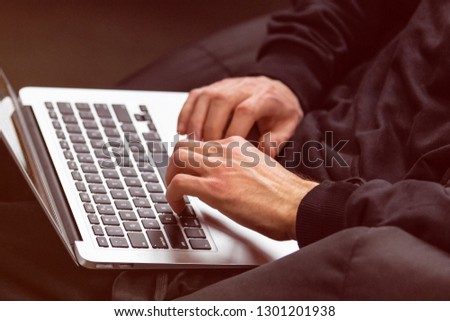 man working in the office at the laptop