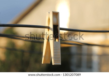 clothespin hanging on a rope