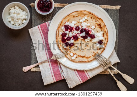 Thin Crepes with Cottage Cheese and Cranberry Jam, copy space for your text