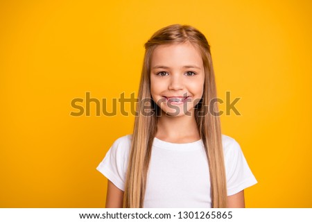 Close-up portrait of her she nice cute adorable attractive lovely pretty winsome sweet cheerful cheery straight-haired girl isolated over bright vivid shine yellow background Royalty-Free Stock Photo #1301265865