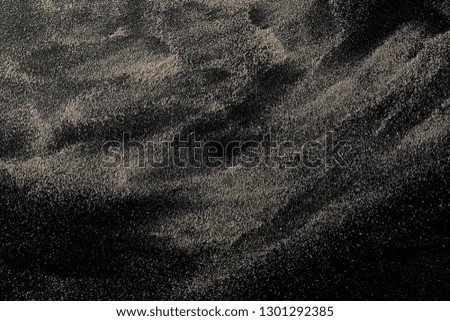 Desert sand isolated on black background and texture, with clipping path, top view