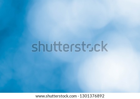Bokeh in a blue natural background, defocused