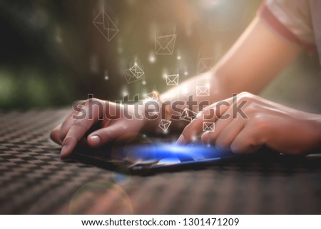 Businesswoman using laptop Tablet with email icon, email concept - image