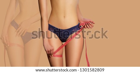 Sports girl on a beige background. blue panties, sports theme. Weight loss. Female body. women's hands measure the waist and legs with a measuring tape