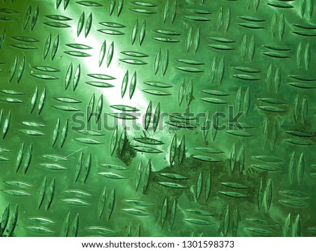 heavy metal green color iron steel surface with diamond texture industrty floor background