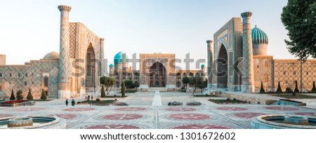 Panorama of Registan square in the city of Samarkand at sunrise, Uzbekistan Royalty-Free Stock Photo #1301672602