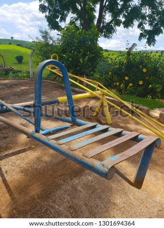 Seesaw made with iron. Outdoor child toy.