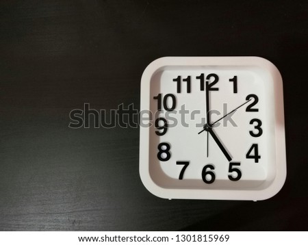 Clock shown 5 o'clock