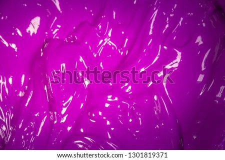 close up purple color of oil paint. ink of screen printing  for print on tee shirts and fabric 
