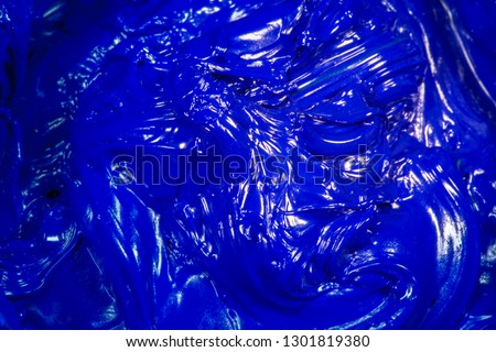 close up dark blue color of oil paint.ink of screen printing  for print on tee shirts and fabric 