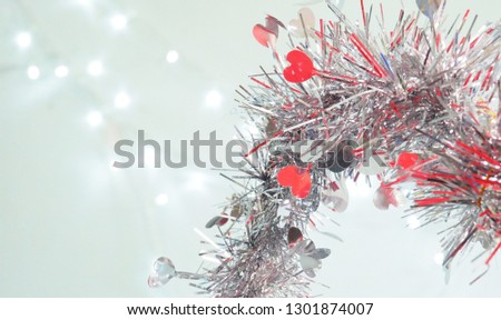 Sparkling heart flying and white light background on Valentine day.
