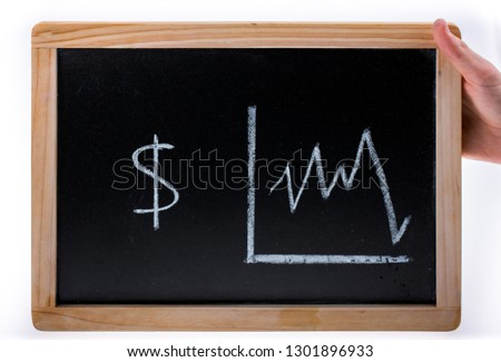 Hand holding American dollars value diagram on a blackboard on a white background