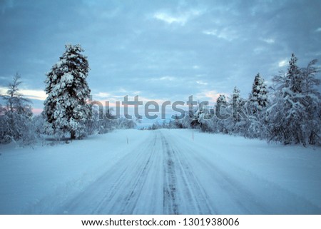 Endless winter road view of Lapland, Finland