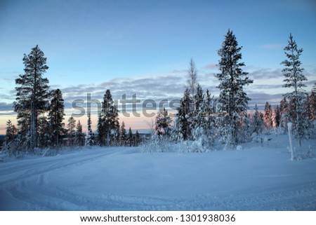 Endless winter road view of Lapland, Finland
