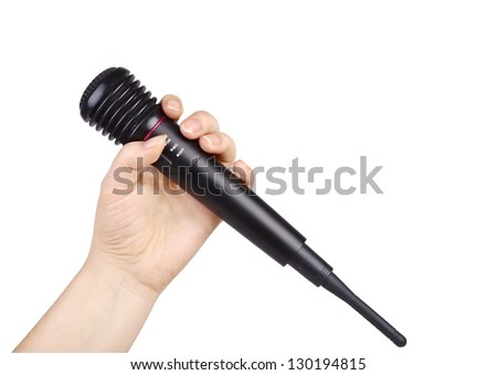 Female hand holding microphone for the interview
