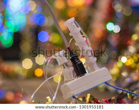 LED power outlet electric extension.  electrical socket with electric plug in.  Cable connector for overloaded power boards. Royalty-Free Stock Photo #1301955181