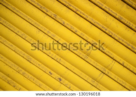 Yellow Background. Diagonal pattern on metal