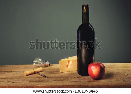 Retro still life with wine and cheese light bulb art