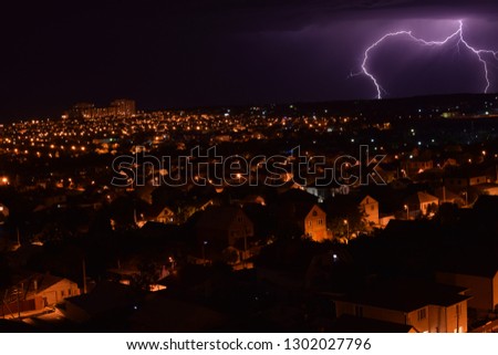 Lightning flashed and buildings