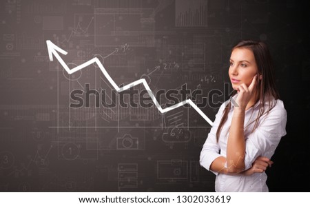 Young person standing with increasing graph concept Royalty-Free Stock Photo #1302033619