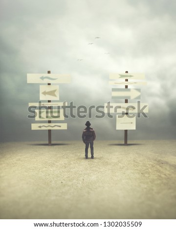 man in doubt  between arrows looking for the right direction