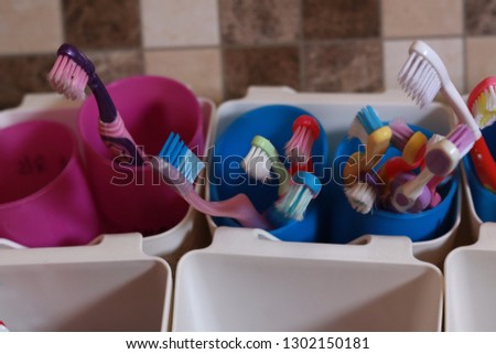 Colorful kid toothbrushes.
