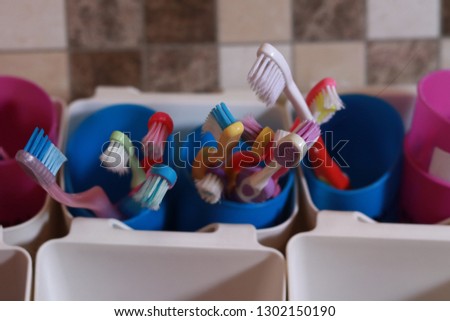Colorful kid toothbrushes.