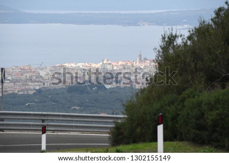 Aerial view of Alghero city from Scala Piccada road.
This road connect Alghero with Villanova Monteleone. Nord Sardinia. Italy.
