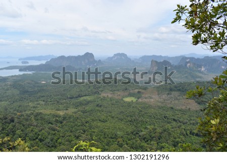 Panorama view from a big rock over Krabi at the jungle hiking trail to dragon crest in Khao Ngon Nak in Krabi, Thailand, Asia Royalty-Free Stock Photo #1302191296