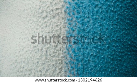 Soft sky blue color textured woolen cloth as an abstract background
