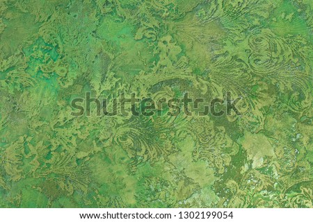 Beautiful, abstract, bright, colored surface of the plaster wall as a background and texture. Possible to use as a stylized surface with space for text