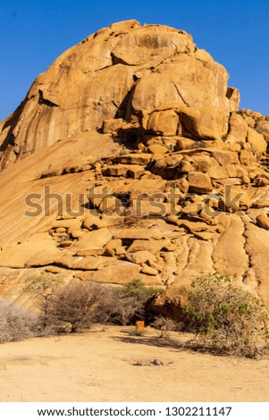 Close up of rock patterns of granite mountain at sunrise in Spitzkoppe, Namibia