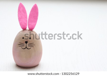 wooden easter bunny with pink ears
